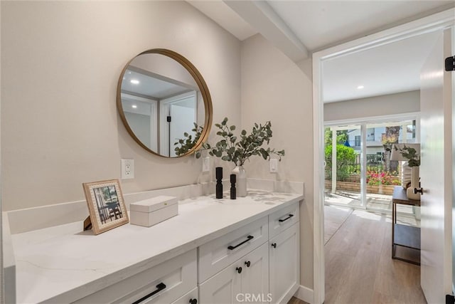 14 Willow Tree Ln, Irvine, CA 92612 - bathroom featuring vanity, wood finished floors, and recessed lighting
