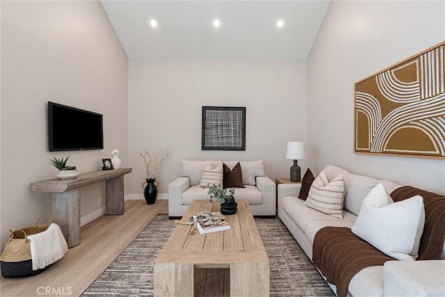14 Willow Tree Ln, Irvine, CA 92612 - living room featuring wood finished floors and recessed lighting