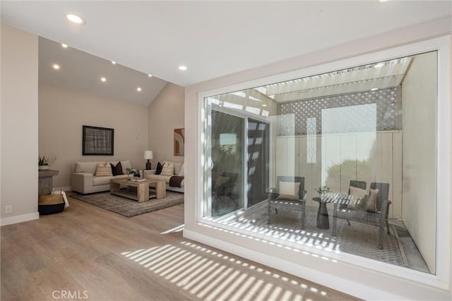 14 Willow Tree Ln, Irvine, CA 92612 - living room with wood finished floors, healthy amount of natural light, recessed lighting, and vaulted ceiling