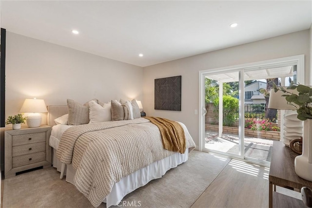 14 Willow Tree Ln, Irvine, CA 92612 - bedroom with access to exterior, recessed lighting, and light wood-style floors