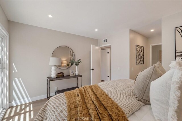 14 Willow Tree Ln, Irvine, CA 92612 - bedroom with recessed lighting and light wood-style flooring
