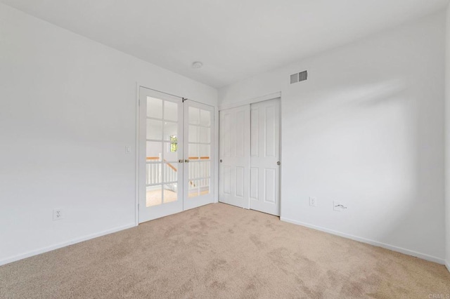 13756 Fontanelle Pl, San Diego, CA 92128 - unfurnished bedroom featuring carpet and french doors