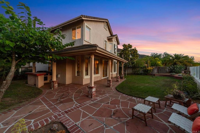 13756 Fontanelle Pl, San Diego, CA 92128 - rear view of house with stucco siding, a fenced backyard, and a patio area