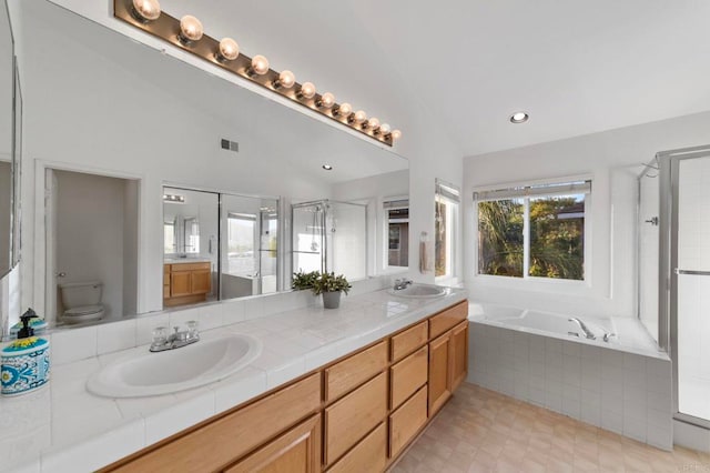 13756 Fontanelle Pl, San Diego, CA 92128 - full bath with double vanity, a shower stall, a bath, and vaulted ceiling