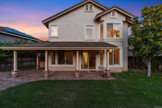 13756 Fontanelle Pl, San Diego, CA 92128 - back of house at dusk featuring stucco siding and a patio