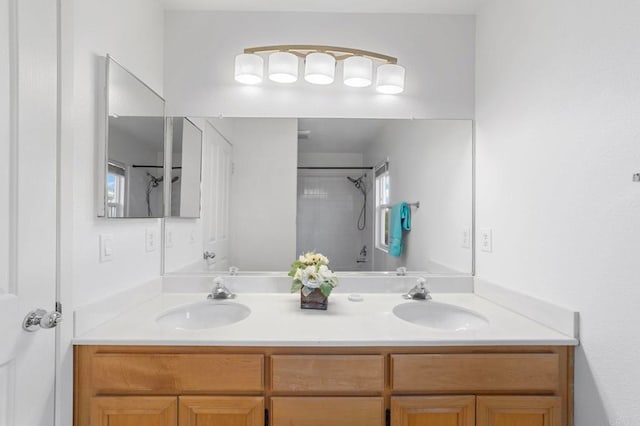 13756 Fontanelle Pl, San Diego, CA 92128 - bathroom with double vanity and a shower