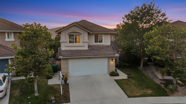 13756 Fontanelle Pl, San Diego, CA 92128 - traditional home featuring concrete driveway, a garage, stucco siding, a tiled roof, and a lawn