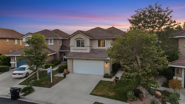 13756 Fontanelle Pl, San Diego, CA 92128 - traditional-style home featuring concrete driveway, a garage, stucco siding, and a tiled roof