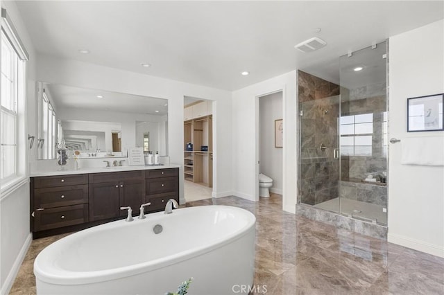 19818 Cornell Ln, Yorba Linda, CA 92886 - bathroom with tiled shower, a freestanding bath, vanity, marble tiled flooring, and recessed lighting