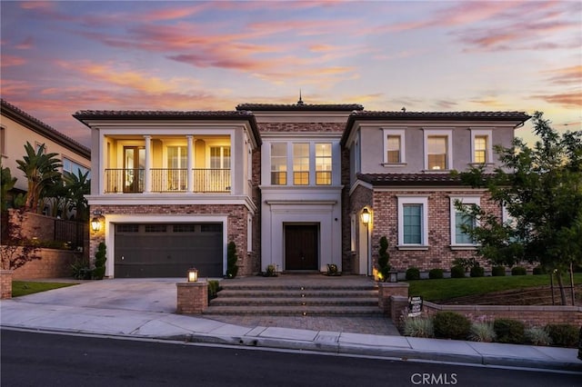 19818 Cornell Ln, Yorba Linda, CA 92886 - view of front of home featuring concrete driveway, an attached garage, a tile roof, stucco siding, and a balcony