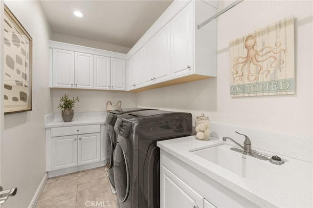 19818 Cornell Ln, Yorba Linda, CA 92886 - laundry room featuring independent washer and dryer, cabinet space, light tile patterned flooring, and recessed lighting