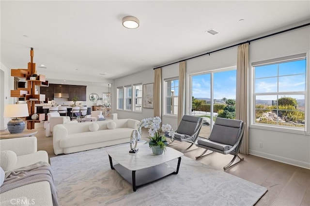 19818 Cornell Ln, Yorba Linda, CA 92886 - living area with light wood-type flooring and baseboards