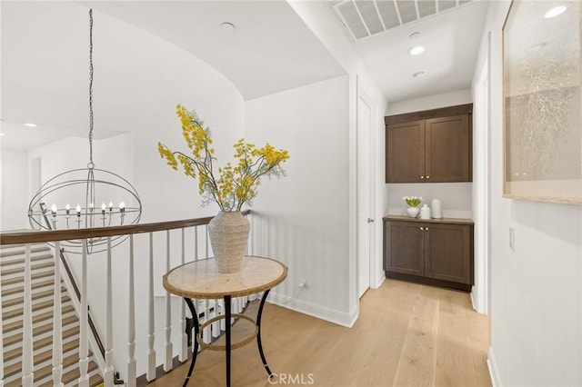 19818 Cornell Ln, Yorba Linda, CA 92886 - hallway featuring a chandelier, light wood-type flooring, and recessed lighting