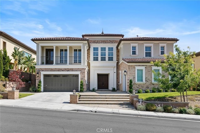 19818 Cornell Ln, Yorba Linda, CA 92886 - view of front of home with an attached garage, concrete driveway, a tile roof, stucco siding, and a balcony