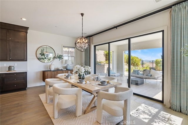 19818 Cornell Ln, Yorba Linda, CA 92886 - dining space featuring a chandelier, light wood finished floors, healthy amount of natural light, and recessed lighting