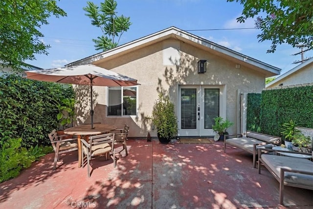 3751 Laurita Ave, Pasadena, CA 91107 - rear view of house with stucco siding, a patio area, and outdoor dining area