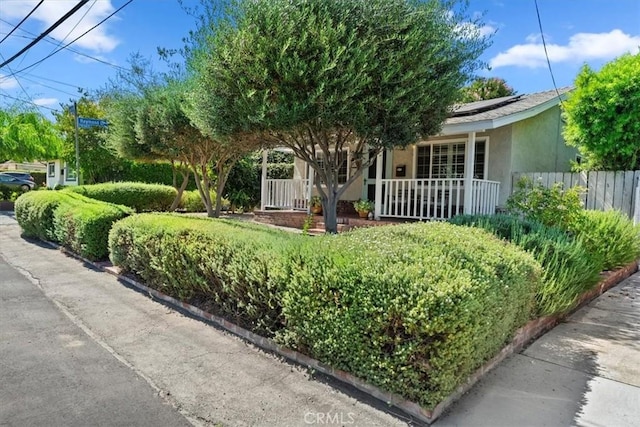 3751 Laurita Ave, Pasadena, CA 91107 - view of front of property featuring stucco siding, solar panels, and covered porch