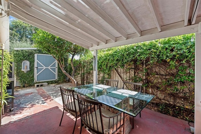 3751 Laurita Ave, Pasadena, CA 91107 - fenced backyard with outdoor dining space, a shed, and a patio area