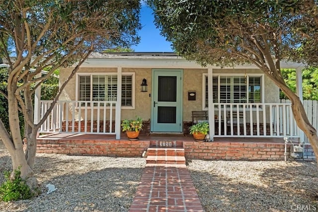 3751 Laurita Ave, Pasadena, CA 91107 - view of front facade with a porch and stucco siding