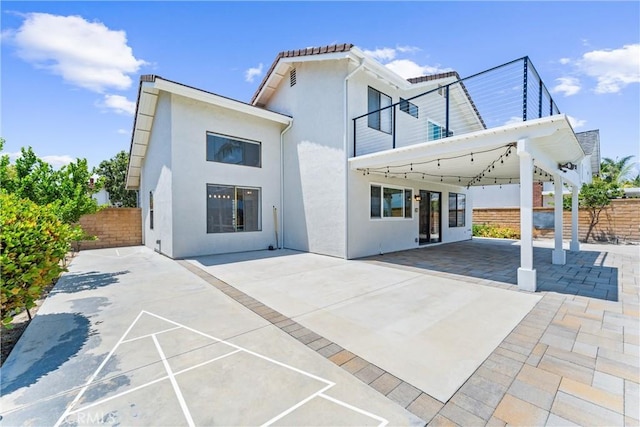 28422 La Pradera, Laguna Niguel, CA 92677 - back of property with stucco siding and a patio