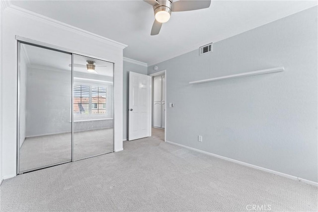 28422 La Pradera, Laguna Niguel, CA 92677 - unfurnished bedroom featuring crown molding, carpet flooring, a closet, and ceiling fan