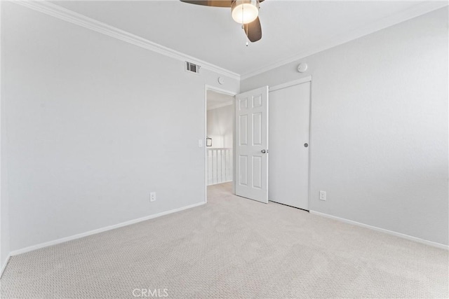28422 La Pradera, Laguna Niguel, CA 92677 - unfurnished bedroom featuring carpet flooring, crown molding, a closet, and a ceiling fan