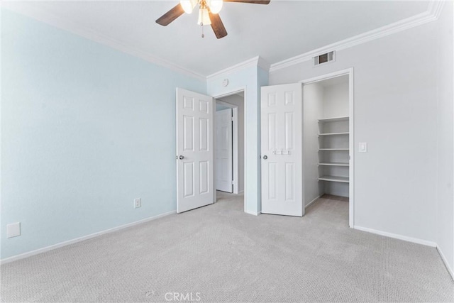 28422 La Pradera, Laguna Niguel, CA 92677 - unfurnished bedroom featuring ornamental molding, carpet, a spacious closet, a ceiling fan, and a closet