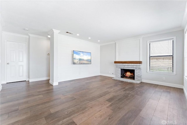 28422 La Pradera, Laguna Niguel, CA 92677 - unfurnished living room with wood finished floors, a brick fireplace, ornamental molding, and recessed lighting