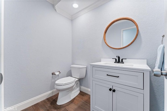 28422 La Pradera, Laguna Niguel, CA 92677 - half bath with ornamental molding, vanity, wood finished floors, and a textured wall
