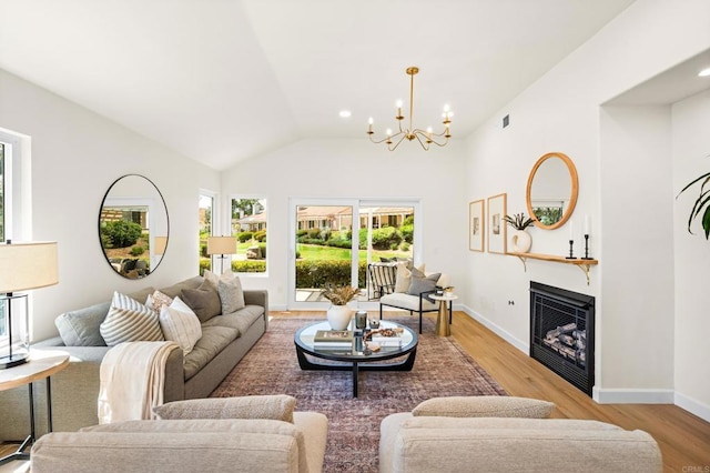 1481 Camino Linda Dr, San Marcos, CA 92078 - living room with vaulted ceiling, a chandelier, light wood-style floors, a fireplace, and recessed lighting