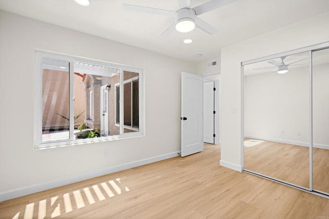 1481 Camino Linda Dr, San Marcos, CA 92078 - unfurnished bedroom with wood finished floors, a closet, recessed lighting, and a ceiling fan