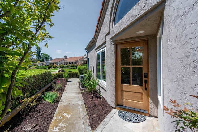 1481 Camino Linda Dr, San Marcos, CA 92078 - doorway to property featuring stucco siding and a residential view