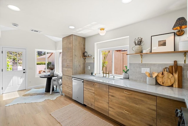 1481 Camino Linda Dr, San Marcos, CA 92078 - kitchen featuring stainless steel dishwasher, open shelves, tasteful backsplash, light wood finished floors, and brown cabinets