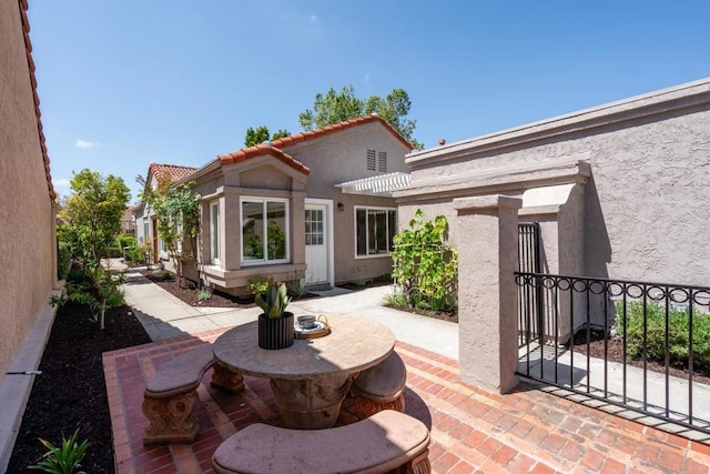 1481 Camino Linda Dr, San Marcos, CA 92078 - back of house with stucco siding, a patio, and a tile roof