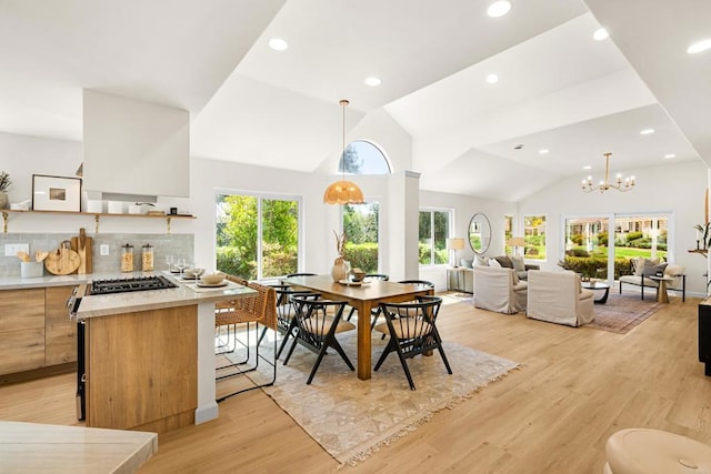 1481 Camino Linda Dr, San Marcos, CA 92078 - dining area with light wood-style flooring, vaulted ceiling, recessed lighting, and a chandelier