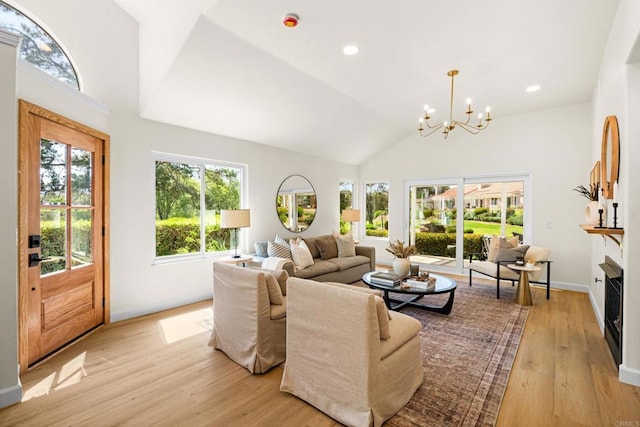 1481 Camino Linda Dr, San Marcos, CA 92078 - living area featuring a chandelier, light wood-type flooring, high vaulted ceiling, and recessed lighting