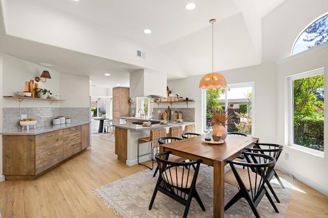 1481 Camino Linda Dr, San Marcos, CA 92078 - dining area with light wood-style flooring, recessed lighting, and lofted ceiling