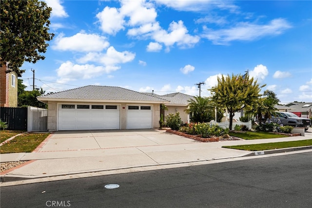 651 Lemke Dr, Placentia, CA 92870 - view of front of house with concrete driveway, stucco siding, and a garage