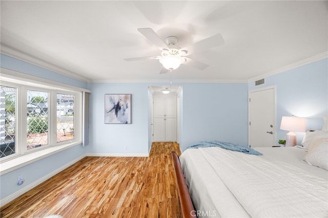 651 Lemke Dr, Placentia, CA 92870 - bedroom featuring light wood-type flooring, crown molding, and a ceiling fan