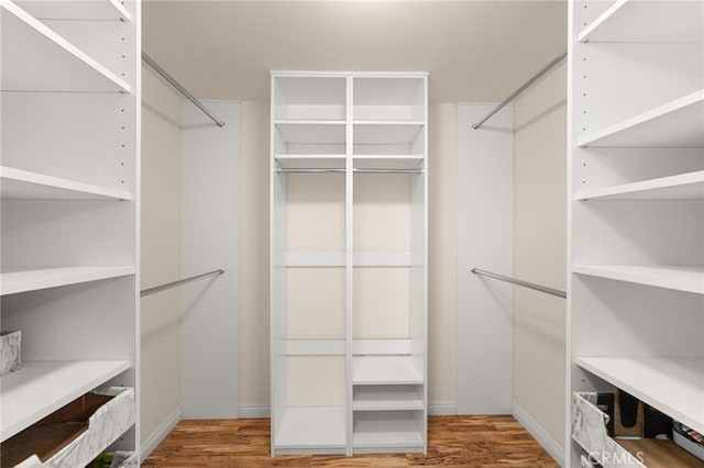651 Lemke Dr, Placentia, CA 92870 - walk in closet with wood finished floors
