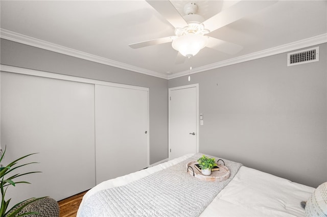651 Lemke Dr, Placentia, CA 92870 - bedroom with crown molding, a closet, wood finished floors, and ceiling fan