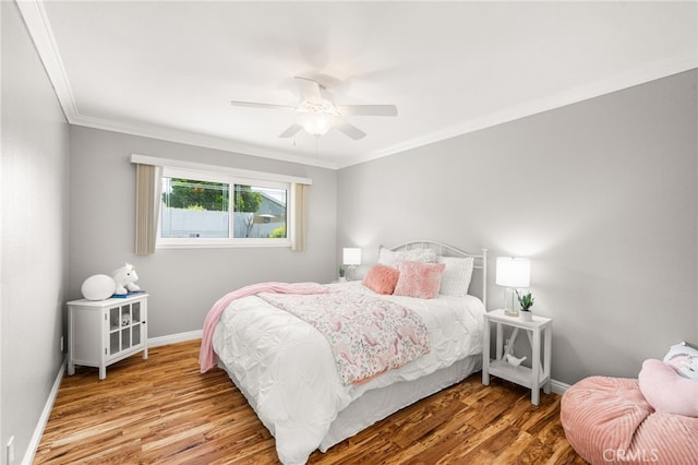 651 Lemke Dr, Placentia, CA 92870 - bedroom with wood finished floors, ornamental molding, and a ceiling fan