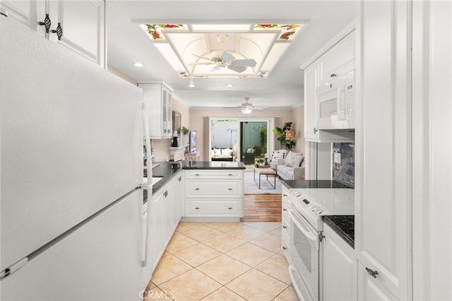 651 Lemke Dr, Placentia, CA 92870 - kitchen with white appliances, ceiling fan, light tile patterned floors, white cabinetry, and recessed lighting