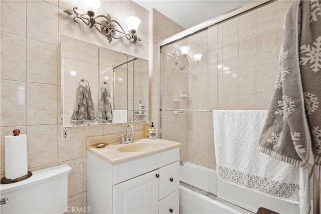 56665672 Franklin Ave, Los Angeles, CA 90028 - full bath featuring tile walls, vanity, and combined bath / shower with glass door