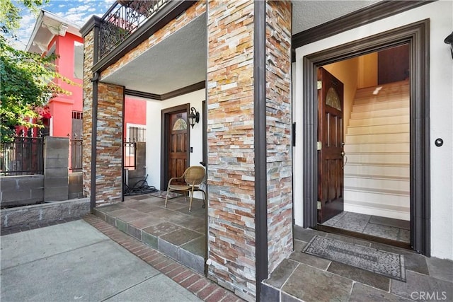 56665672 Franklin Ave, Los Angeles, CA 90028 - property entrance with covered porch and stone siding