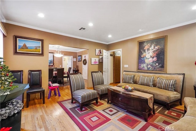 56665672 Franklin Ave, Los Angeles, CA 90028 - living area featuring light wood finished floors, crown molding, and recessed lighting