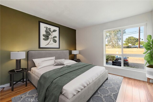 5585 E Pacific Coast Unit 144, Long Beach, CA 90804 - bedroom featuring wood finished floors