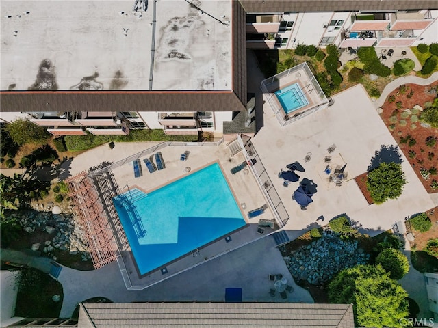 5585 E Pacific Coast Unit 144, Long Beach, CA 90804 - drone / aerial view of a pool