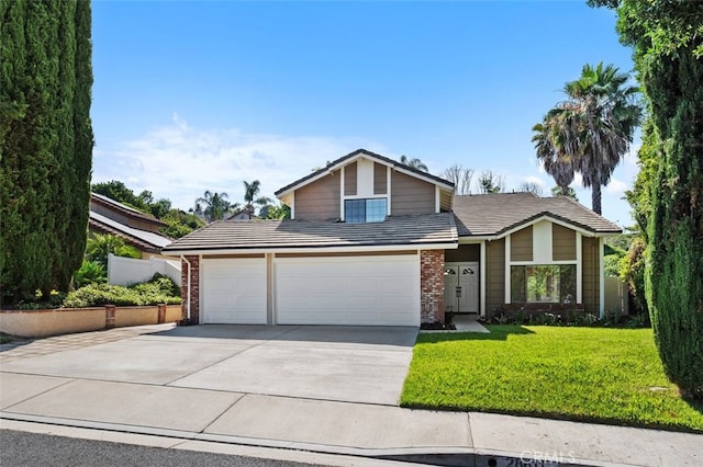 28611 Avenida Del Caballo, Laguna Niguel, CA 92677 - view of front facade with driveway, a garage, brick siding, and a front yard