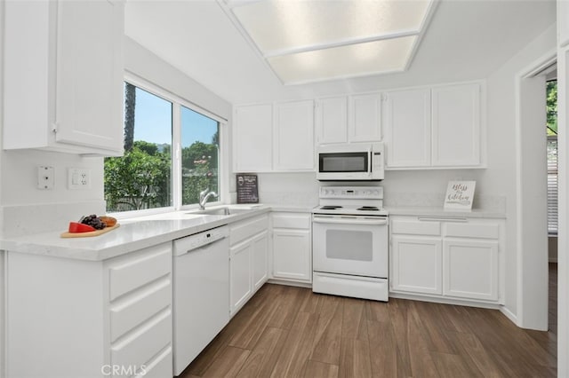 28611 Avenida Del Caballo, Laguna Niguel, CA 92677 - kitchen with white appliances, healthy amount of natural light, and white cabinets